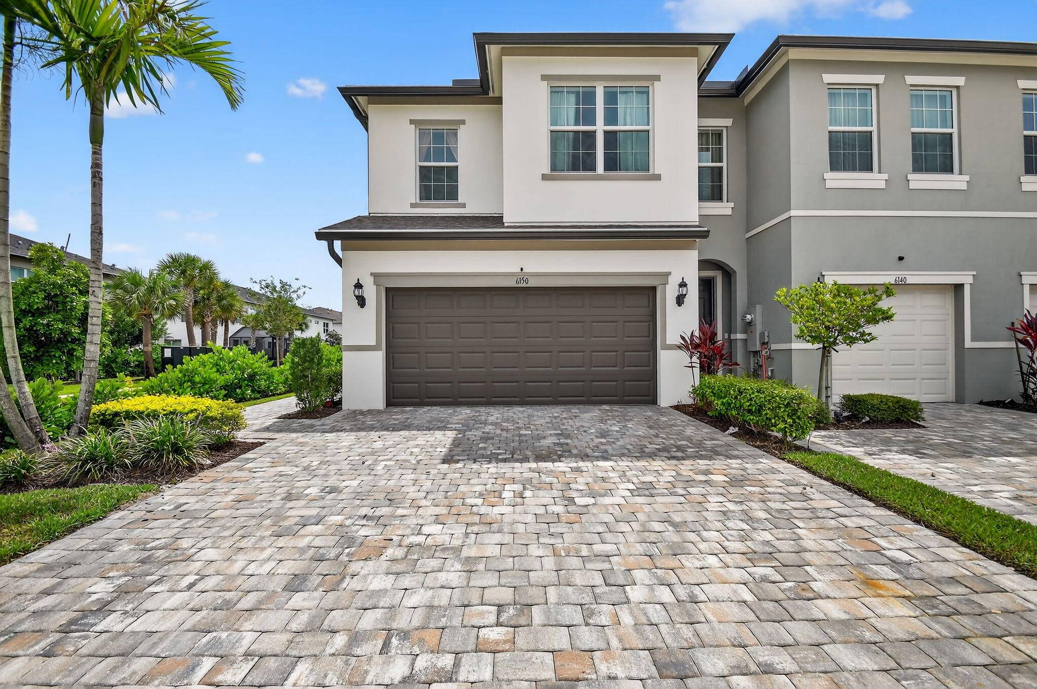 Nestled in the heart of the Ranchette Road Townhomes community, this nearly new lakefront townhome delivers a seamless blend of elegance, comfort, and modern convenience.