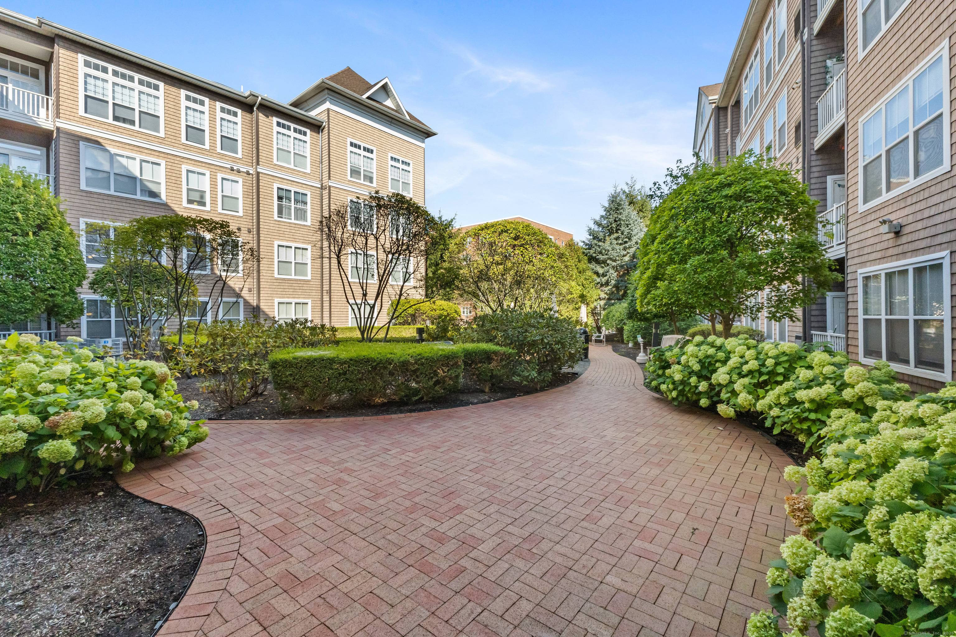 This fantastic and spacious two bedroom, two bath condominium is perfectly located in the heart of downtown Stamford.