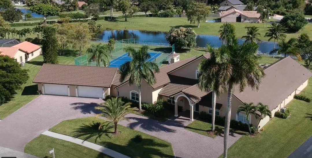 Beautiful, HUGE home in the highly sought after gated community Winding Lakes Estates.