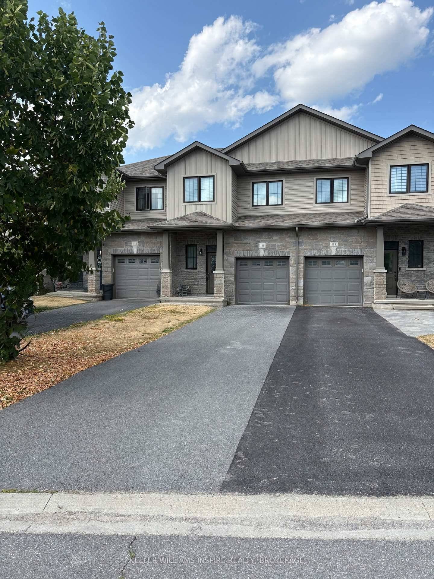 Welcome to 131 Simurda Court, a fantastic middle unit freehold townhome built in 2014, offering exceptional value in a desirable cul de sac location in Loyalist, just moments from Kingston.