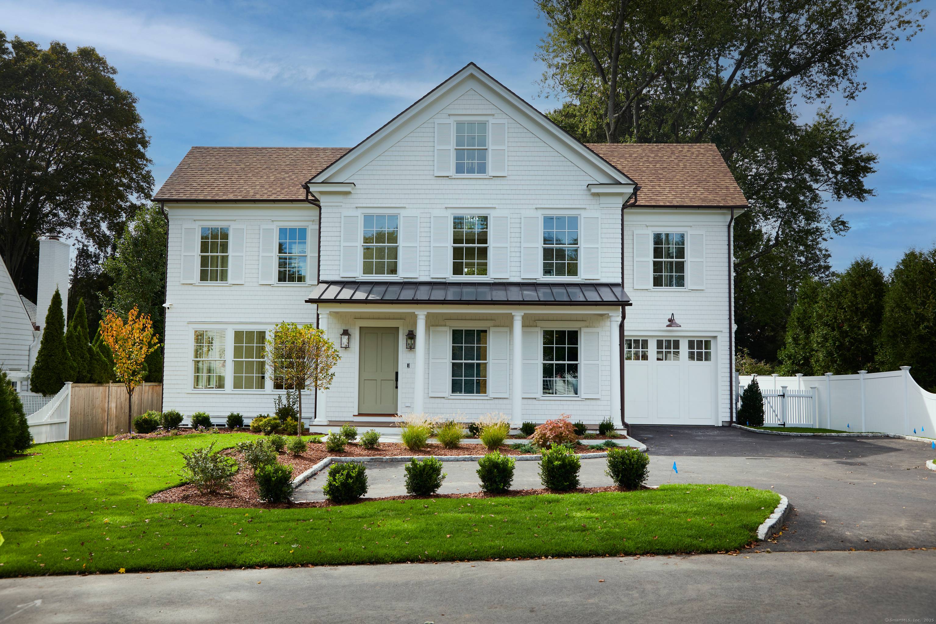 Nestled in one of Westport's most desirable walk to town neighborhoods, this exceptional new construction home combines timeless charm with modern luxury.