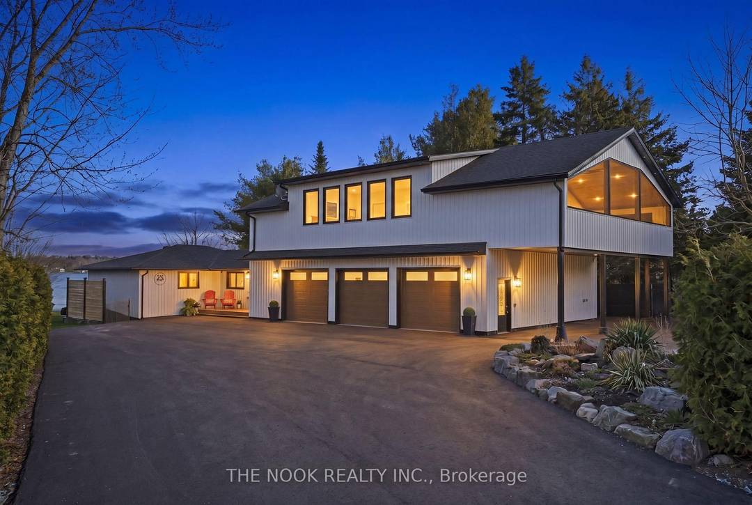 A rare waterfront estate offering uncompromising luxury, privacy, and multi generational versatility, this fully reimagined residence presents a refined lakeside lifestyle defined by architectural clarity, elevated design, and exceptional south ...