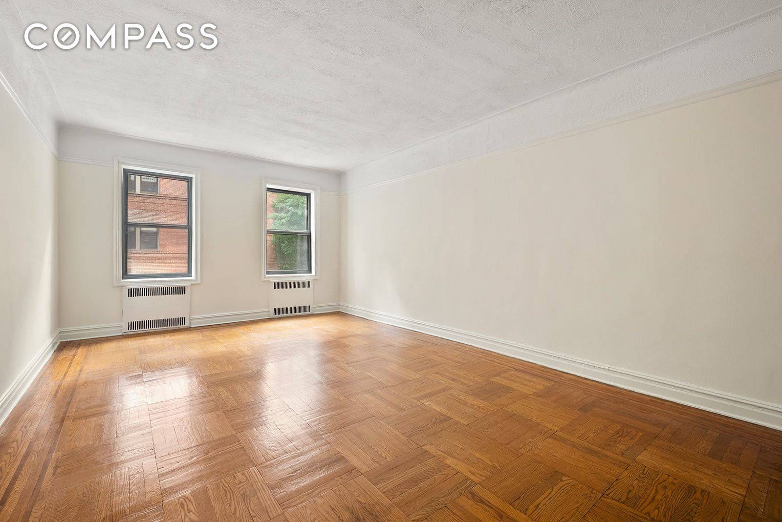 Be the first to see this generously scaled 2BR 2BA pre war coop in a prime location in Jackson Heights Historic District.