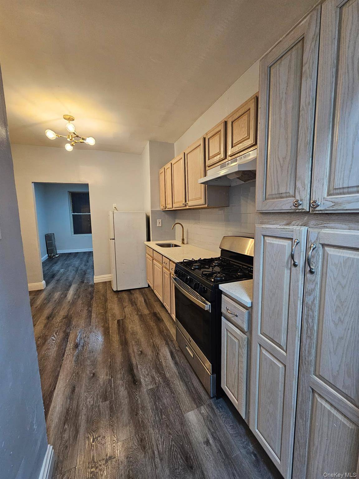 Renovated 3 bedroom apartment with spacious rooms, ample closets, and close proximity to shopping and public transportation.