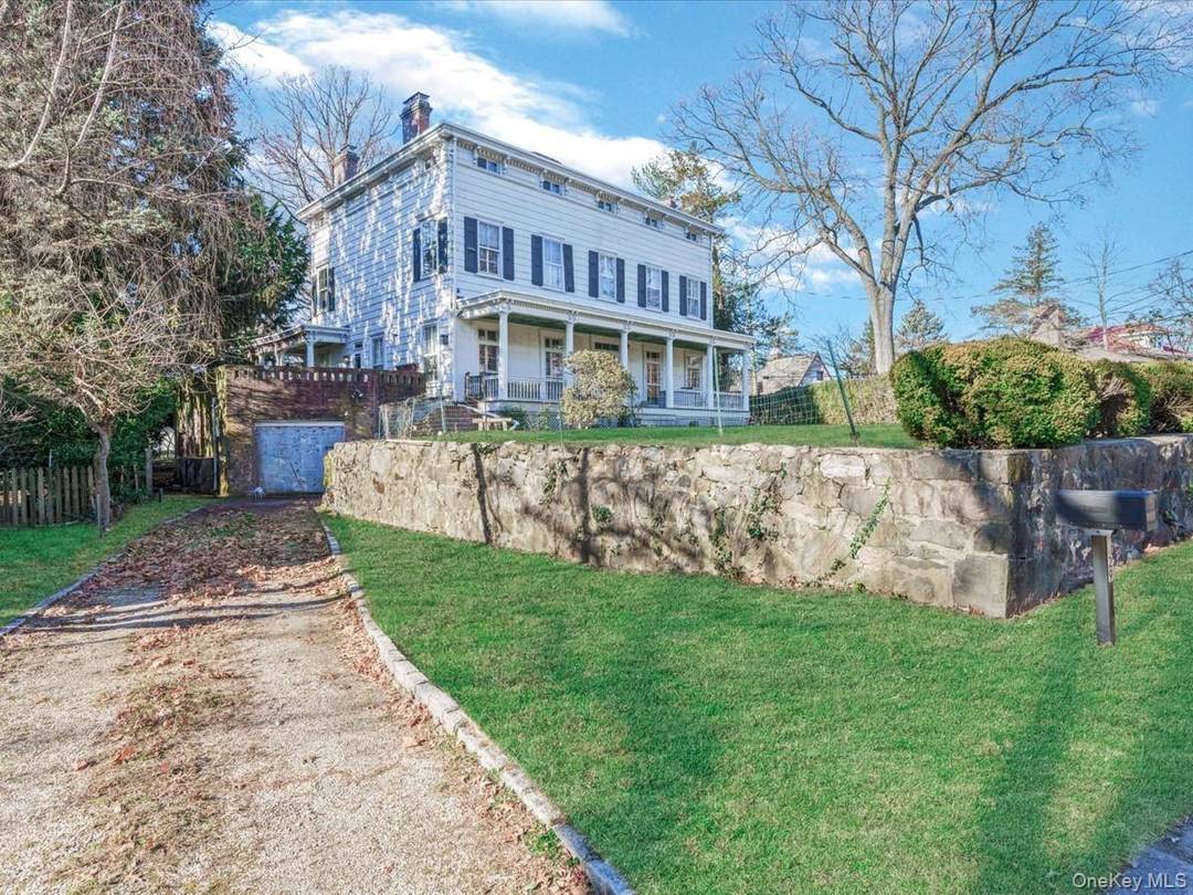 This is a rare opportunity to own a Classic Greek revival home in the exclusive waterfront community of Douglas Manor.