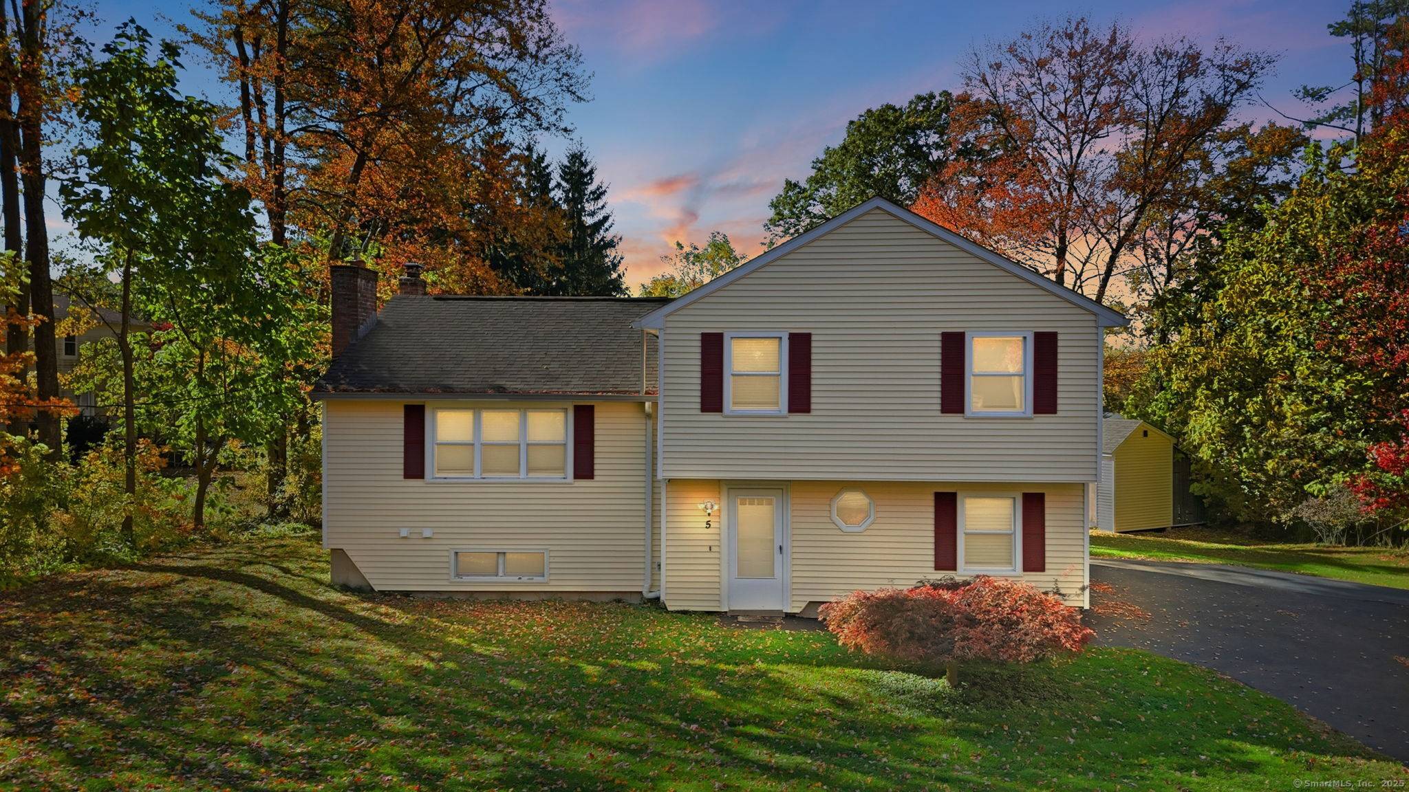 Experience the comfort and charm of this well maintained split level home !