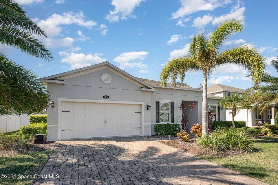 Welcome to this beautifully updated home in the highly desirable Egrets Landing community of North Merritt Island !