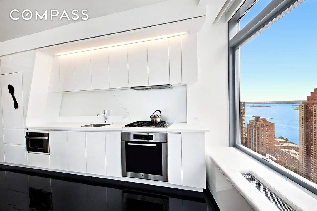 A stunning two bedroom, two bathroom apartment with a wide open floor plan and breathtaking views of One World Trade, the Statue of Liberty and the Hudson River, this home ...