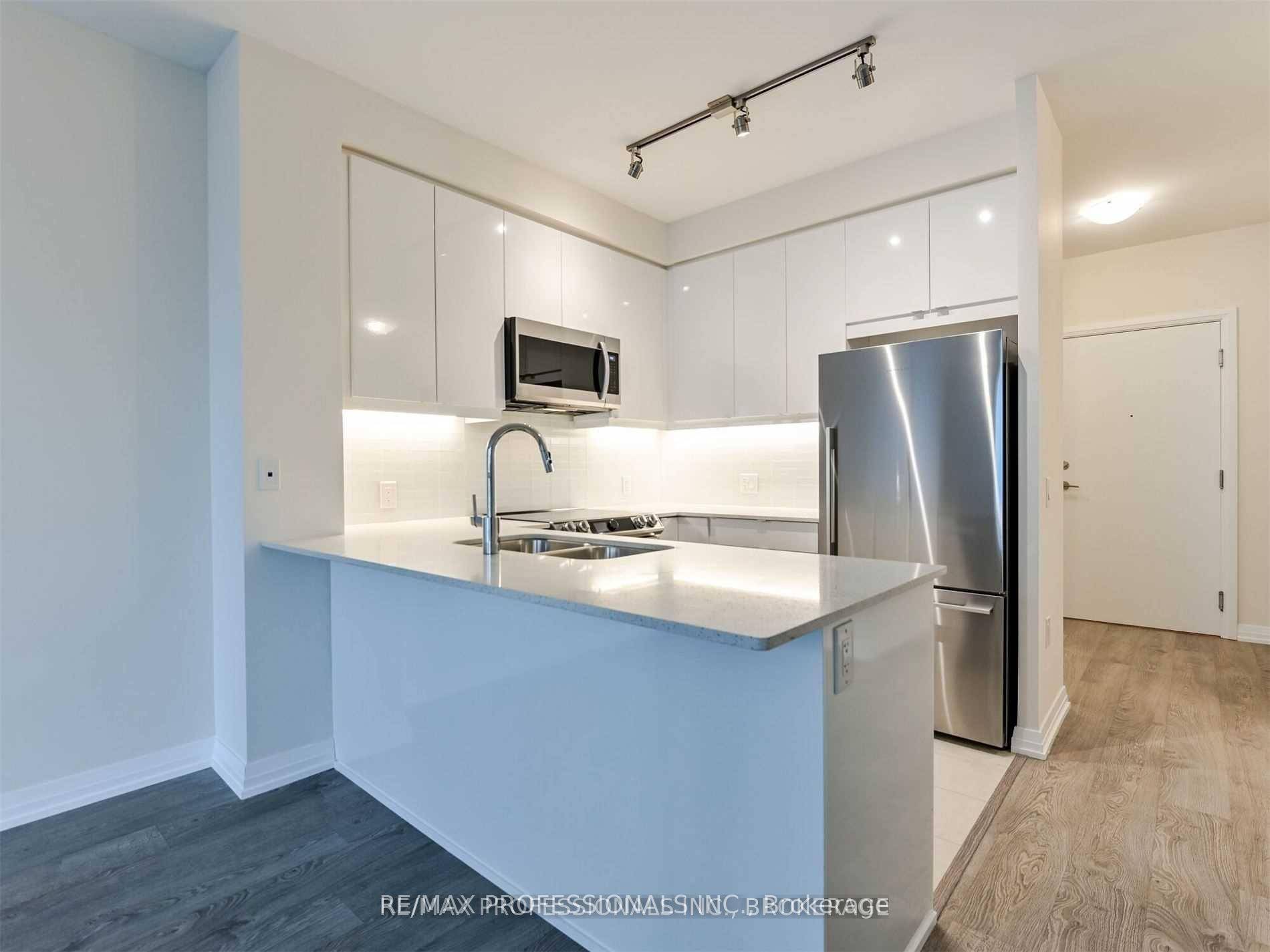 Welcome to this bright and modern 1 Den corner unit at Cypress at Pinnacle, offering stylish urban living with exceptional convenience.