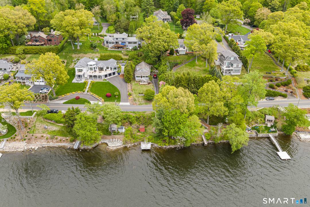 Experience exceptional lakefront living in this charming 2 3 bedroom, 3 bath home set on a waterfront lot with stunning western sunset views over Candlewood Lake.