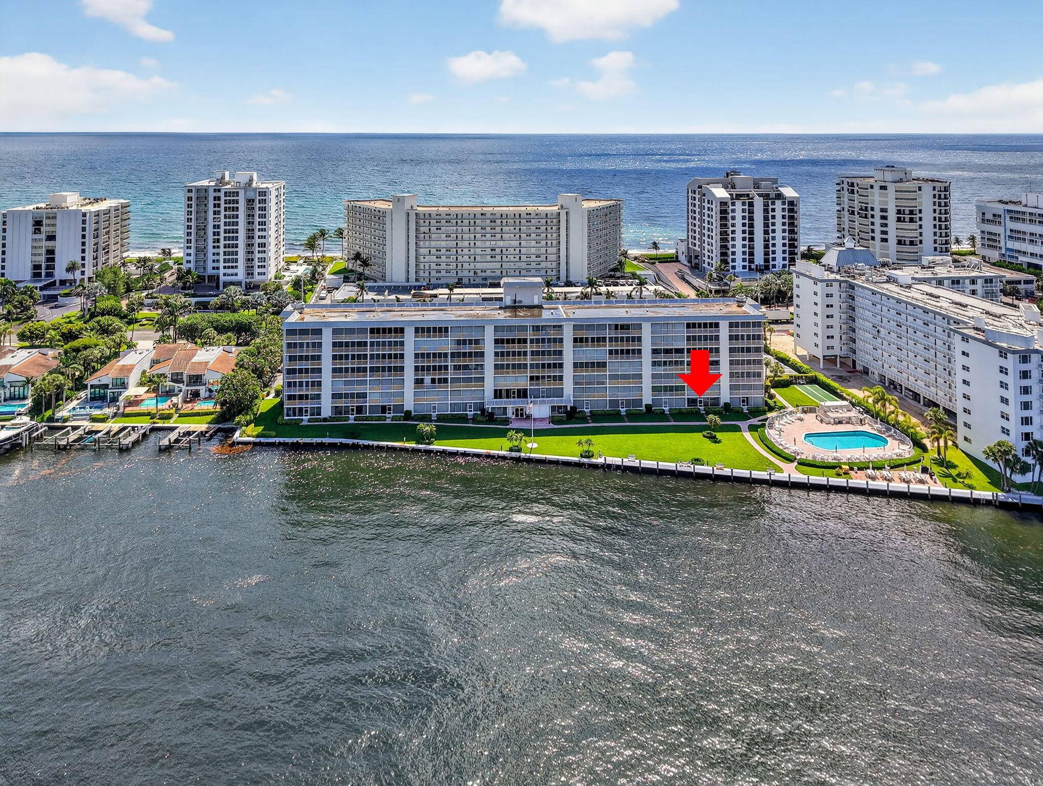 Enjoy direct Intracoastal views and breathtaking sunsets from this rarely available first floor unit in the heart of Highland Beach.