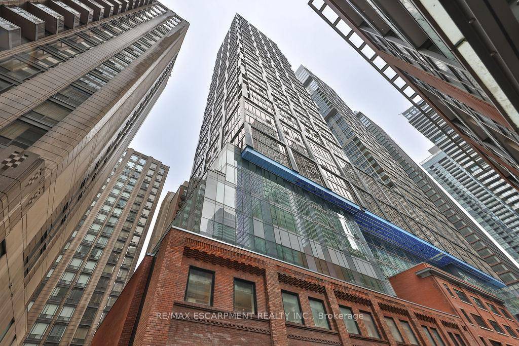 Welcome to Unit 325 at 15 Mercer Street, a sophisticated 2 1 bedroom condo in the heart of downtown Toronto.
