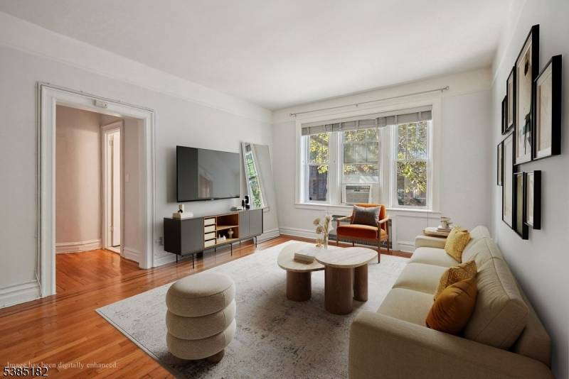 Charming, spacious 2 bedroom first floor condo in an historic pre war gem in McGinley Square.