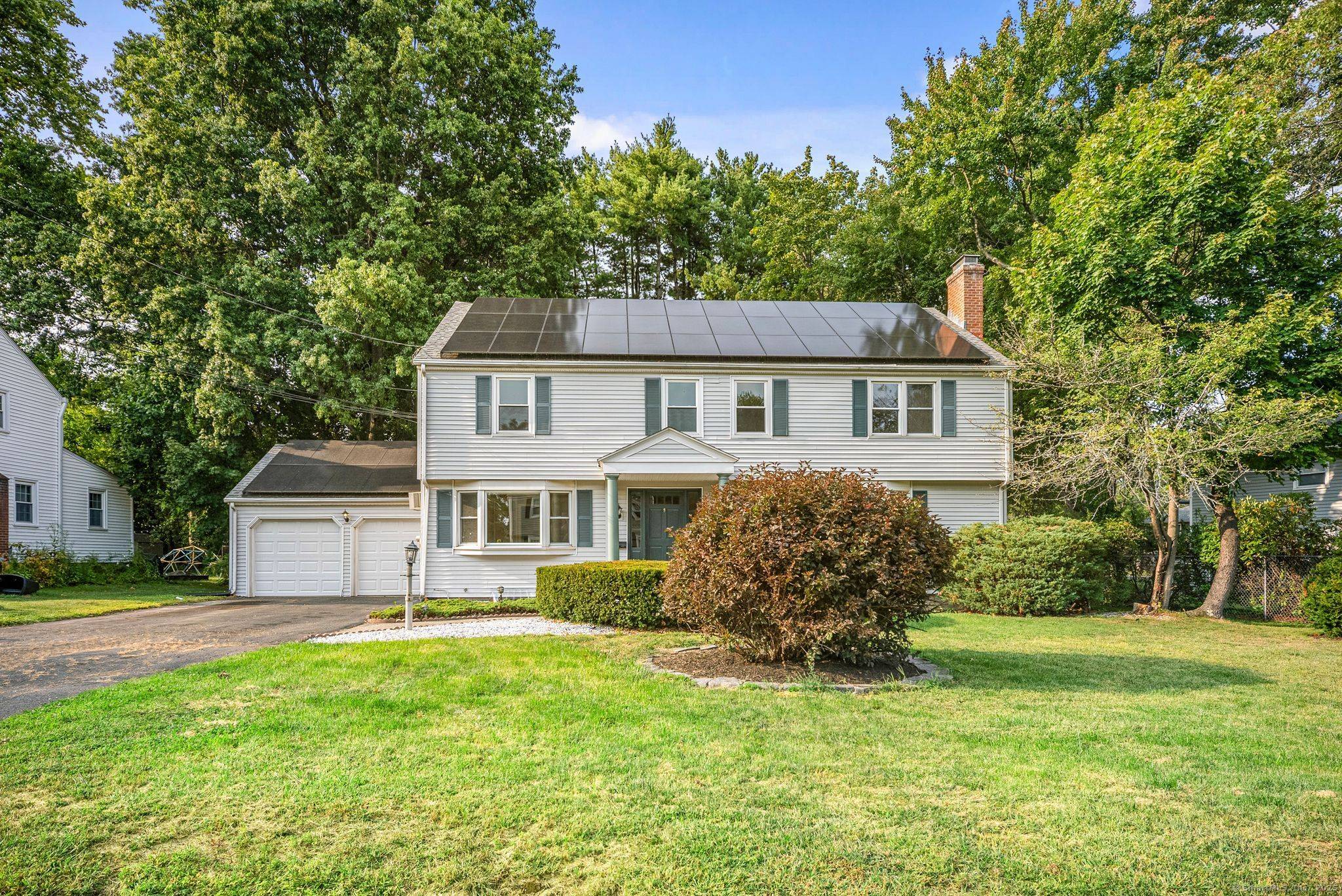Welcome to 8 Tanglewood Road, a beautifully updated home in sought after West Hartford.