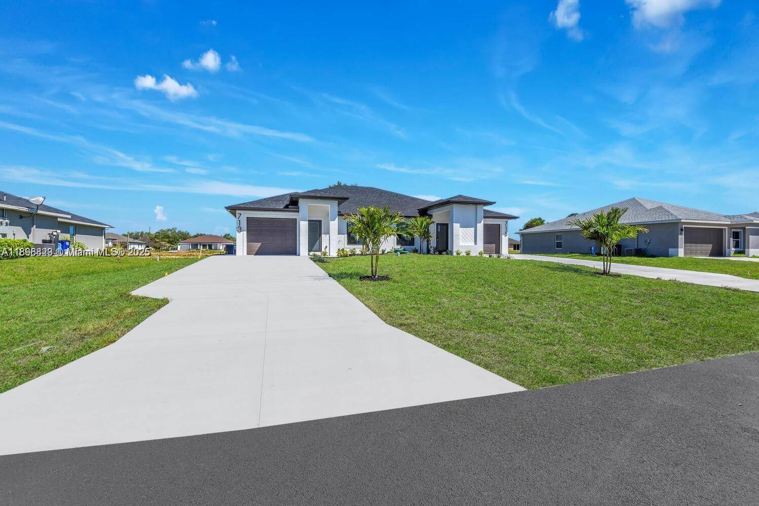 Stunning corner duplex located across from the only golf course in the area !