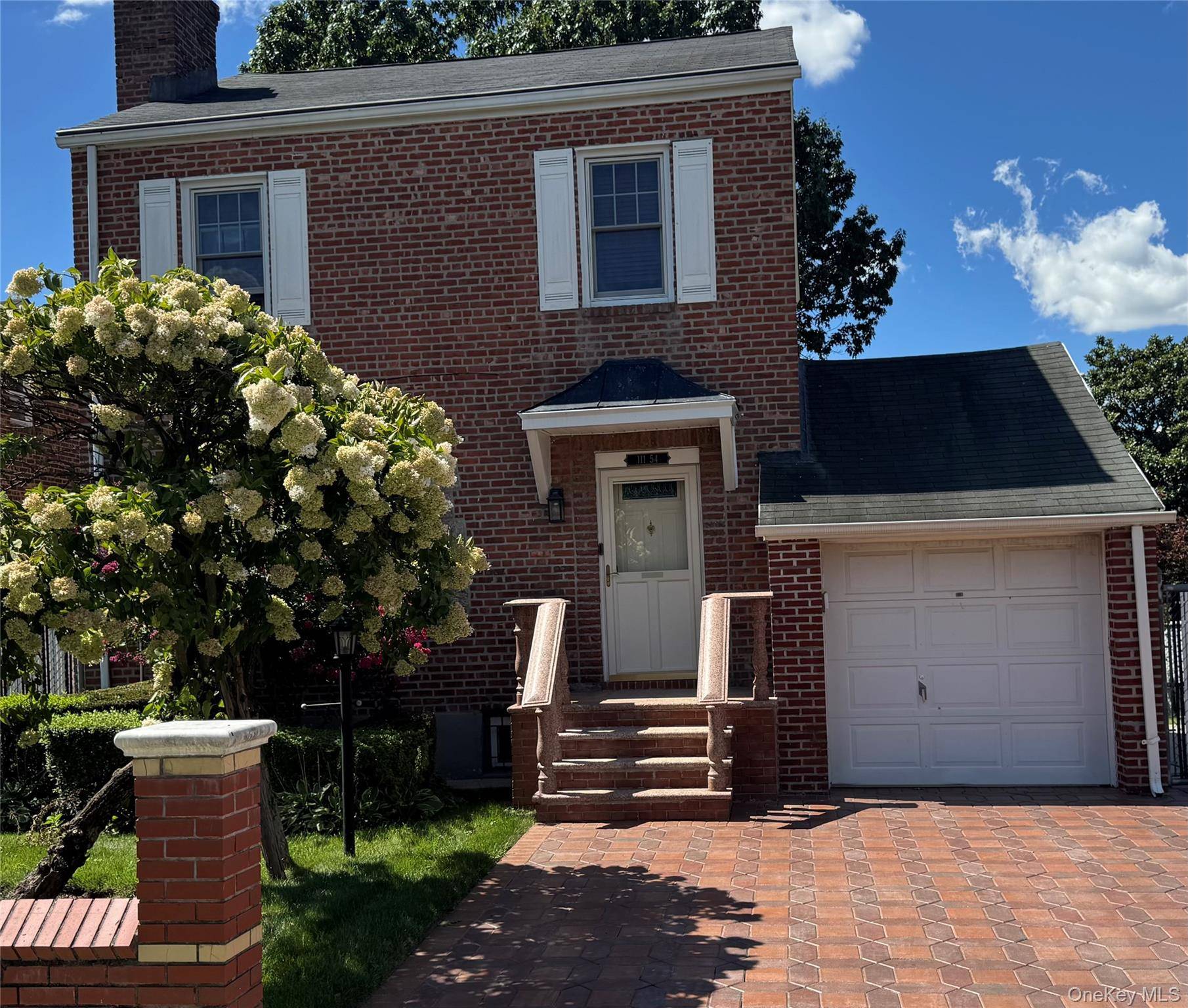 Located in Historic Addisleigh Park this Charming 3 bedroom and 2 bathroom Cape Cod property is nestled on an oversized lot ; with a one car garage and brick paved ...