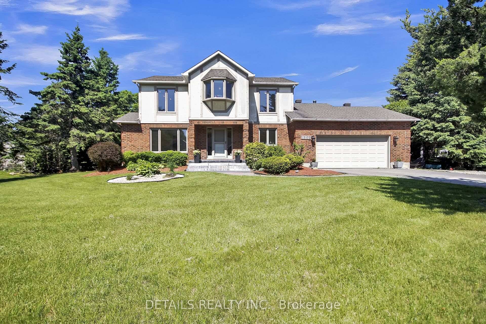 This grand beauty is situated on a private landscaped lot with inground heated pool, lounging area with gazebo and deck.