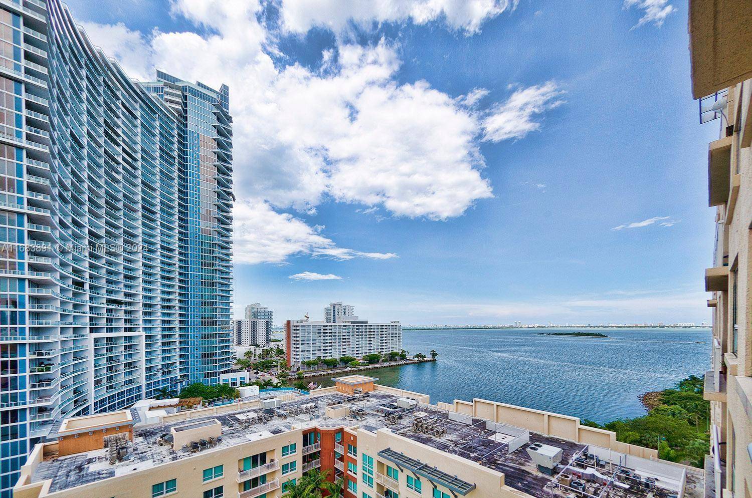 BEST LOCATION Trendy amp ; vibrant East Edgewater REMODELED 2 2 condo w partial NE East Bay views !