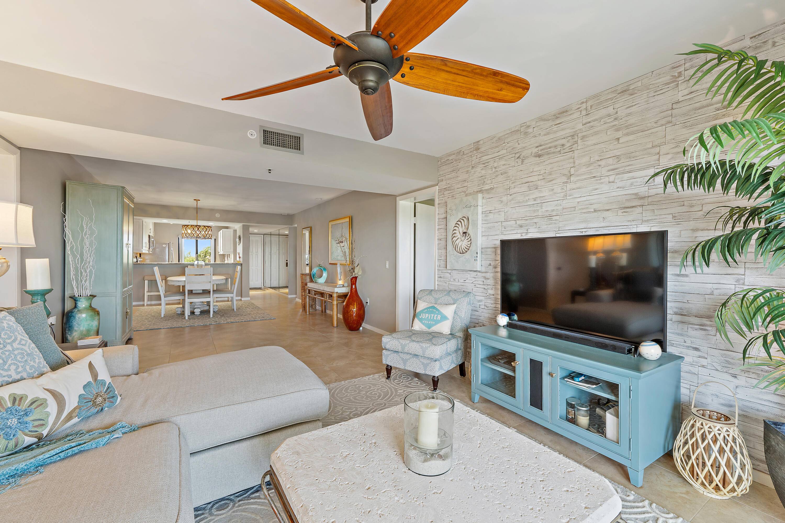 Embrace the perfect Jupiter Beach lifestyle in this RENOVATED ocean view condo, with convenient private beach access and all the charm of coastal living.