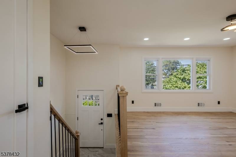 1683 Lawrence St, completely updated and renovated, is located on a spacious corner lot.