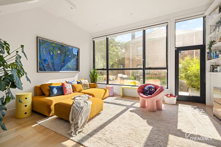 Totally and meticulously rebuilt from the ground up, this bespoke triplex in a Williamsburg townhouse designed and executed by the owner features 18.