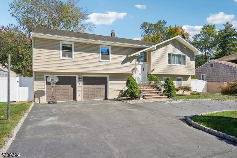 Welcome home to this well maintained Bi Level nestled on a large, private lot in the heart of Wayne.