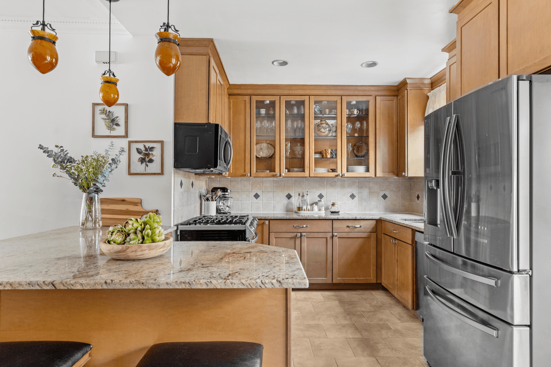 253 21st Street is a 20 foot wide, three family townhouse located in prime Greenwood.