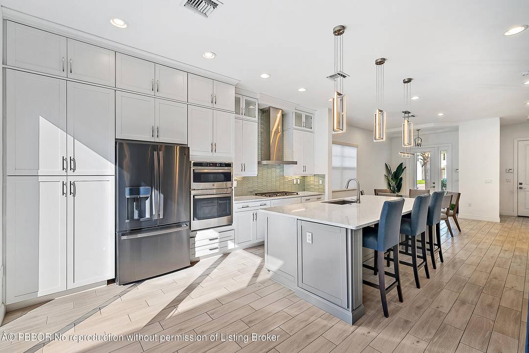 Built in 2022, this modern single family residence is located inside a private, gated enclave of just 24 homes, offering a rare combination of privacy, quality construction, and everyday convenience.