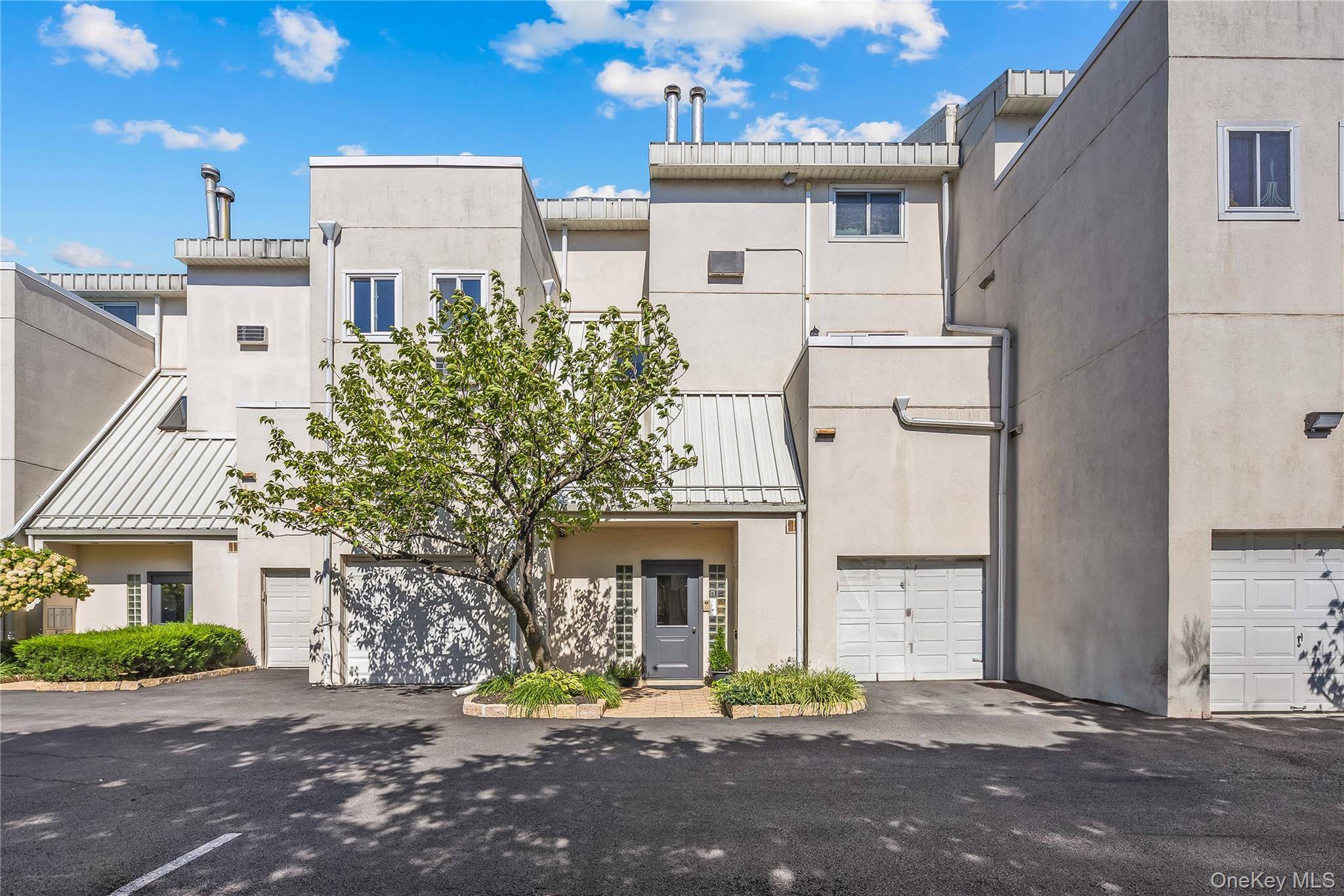 Welcome to this waterfront 3 bedroom, 3 bath duplex in the exclusive gated community of White Beach Condominiums in Throggs Neck.