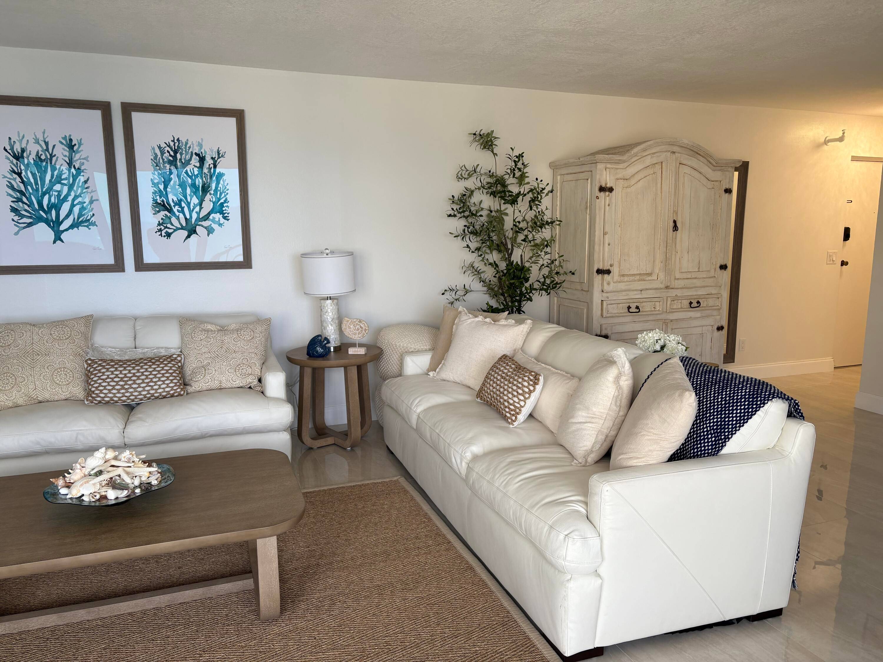 fabulous high floor east view from this newly renovated condo on the wide section of Singer Island Beach.