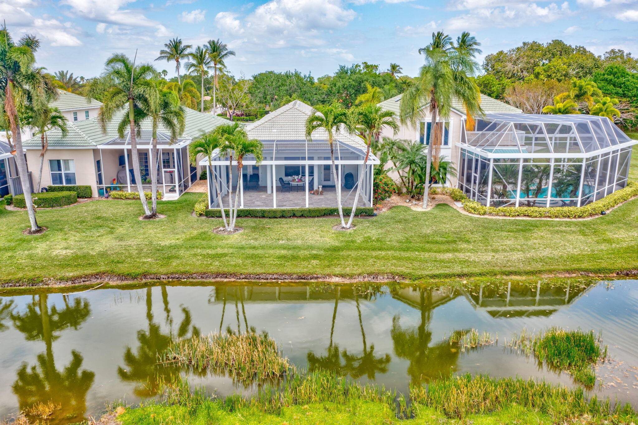 Welcome to luxury living on the prestigious Palmer Golf Course in PGA National !