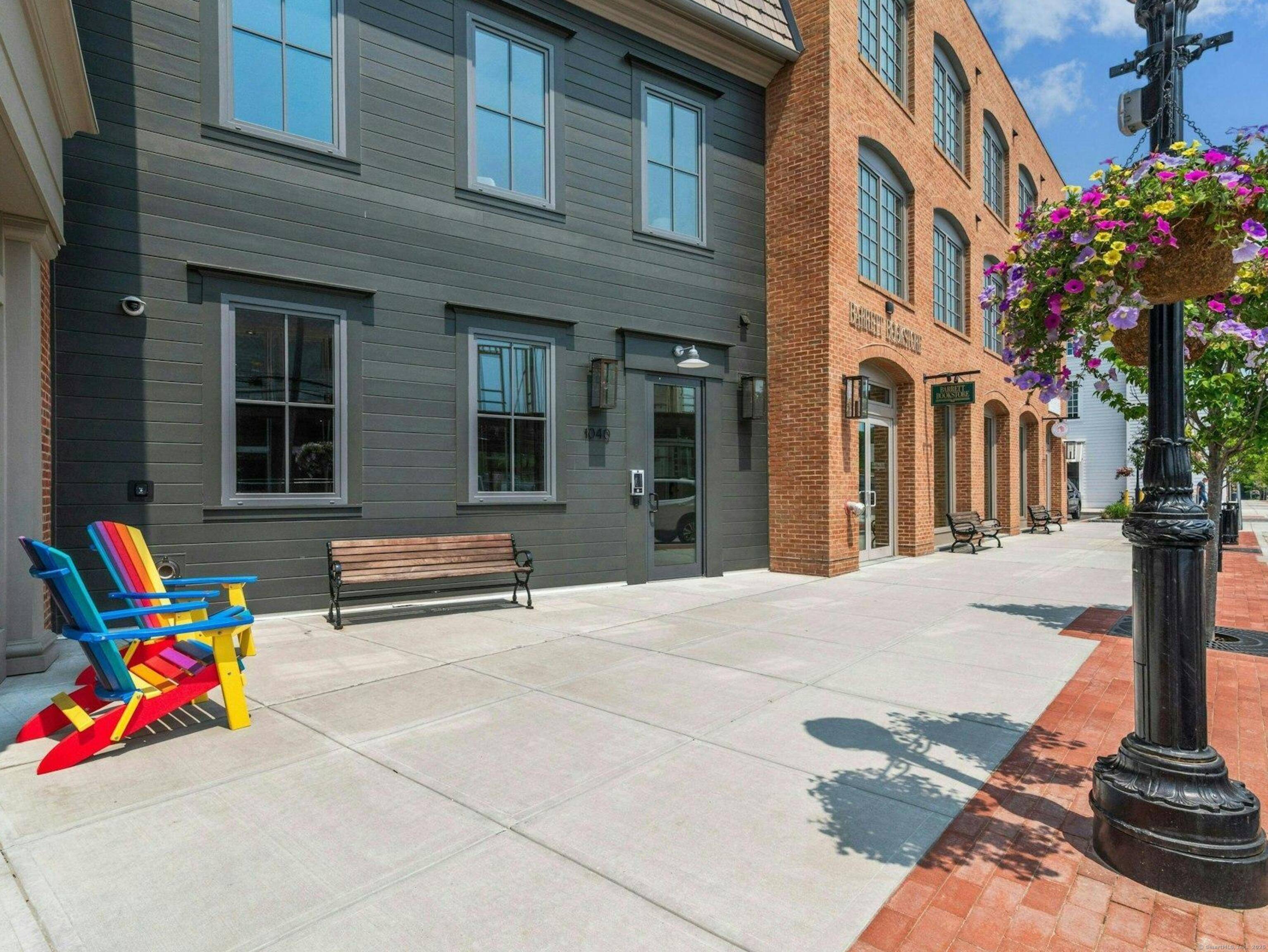 Step into this luxury corner unit that offers refined elegance, modern design, and privacy all in the heart of downtown Darien's premier neighborhood, The Corbin District.
