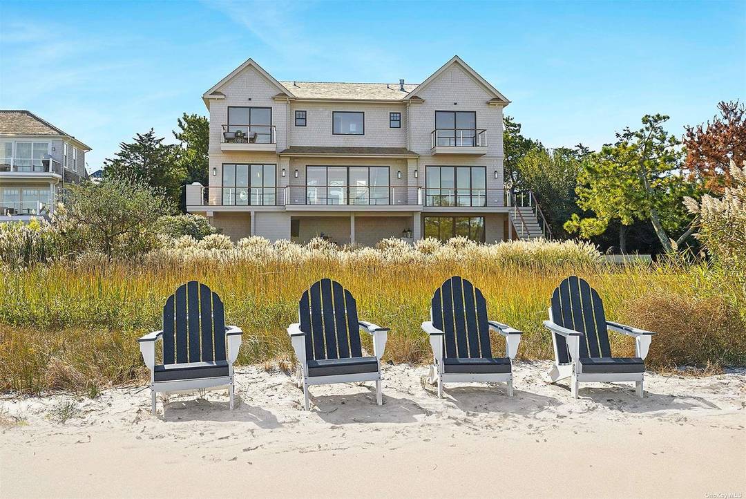Discover luxury waterfront living at 218 Dune Road, Westhampton Beach.