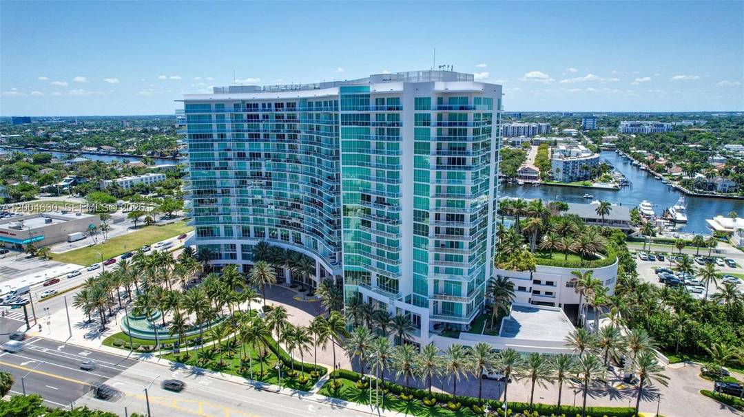 Experience refined coastal living in this premier, original owner residence at the prestigious Plaza at Oceanside.
