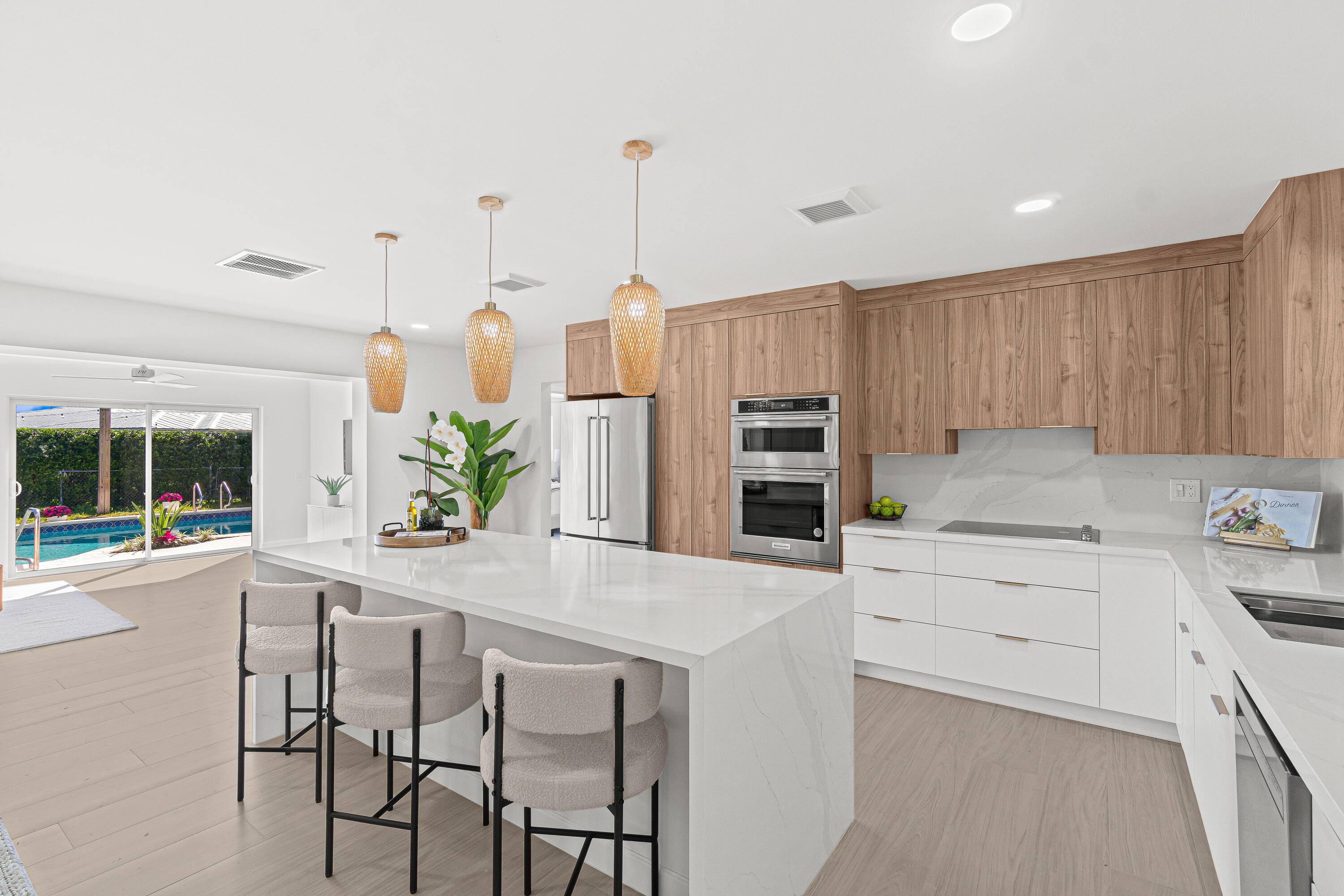 Step into luxury living at its finest in this completely renovated home featuring 3 spacious bedrooms w ENSUITE baths, plus powder room, PLUS OFFICE, family room, 2 car garage, BRAND ...