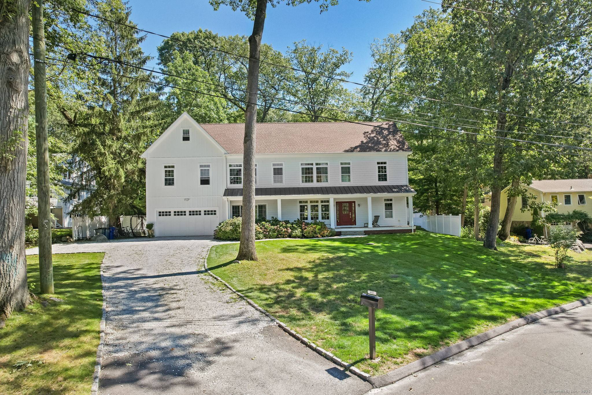 Welcome to 40 Arnold Lane, a charming oasis nestled in a peaceful cul de sac in Rowayton.