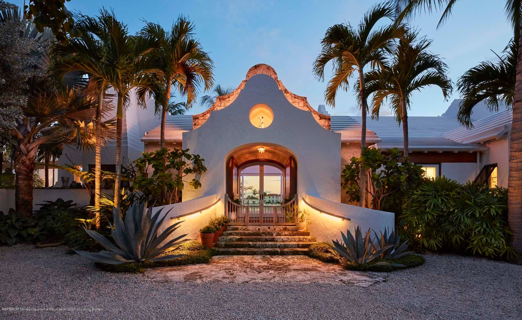 Authentic Bermudian style house with 232' of rare south facing Intracoastal frontage and golf course views.