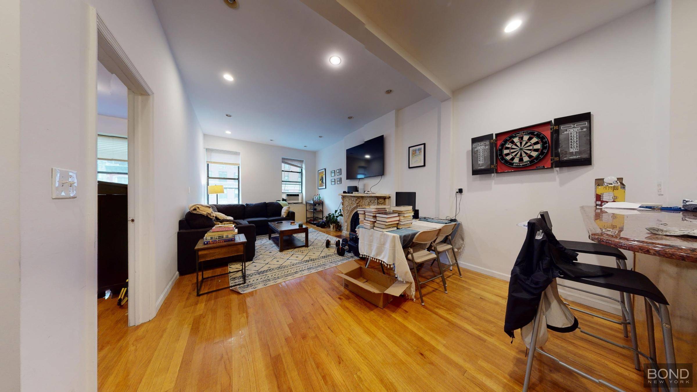 Massive 3 bedroom apartment feature large living room with a deco fireplace, open kitchen with a breakfast bar and lots of cabinets, queen size bedrooms, hight ceilings and great natural ...