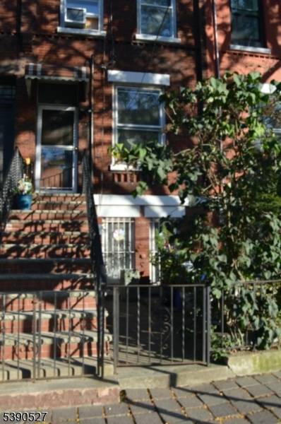 LOVELY BROWNSTONE IN THE BERGEN LAFAYETTE AREA WITH SO MUCH POTENTIAL AND IN NEED OF TLC.