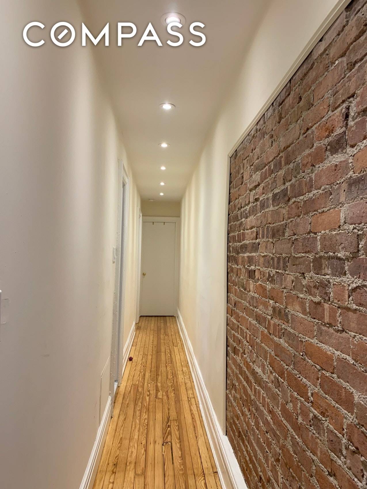 Sprawling Limestone Floor through, A true three bedroom offers an abundance of living space, with a formal dining room featuring coffered ceilings, with recessed lighting.