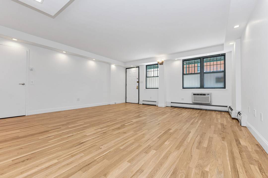 PRIME EAST VILLAGE CONDO Welcome to this rare three bedroom, 1.