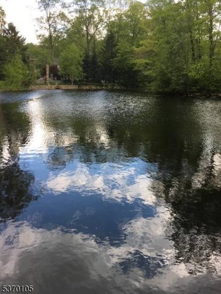 Beautiful Lakefront w full views of Indian Lake from the front and of Indian Spring lake from the back.