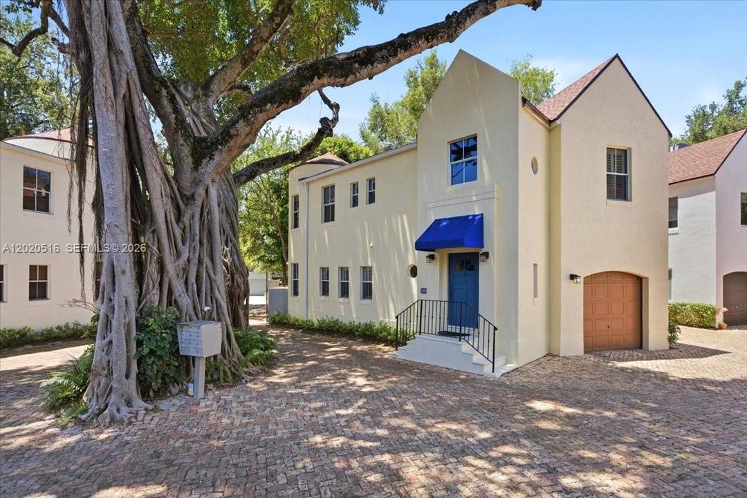 FREE STANDING French Country style townhome in a gated community located on one of the best streets known for being quiet, low traffic in the heart of Center Grove.