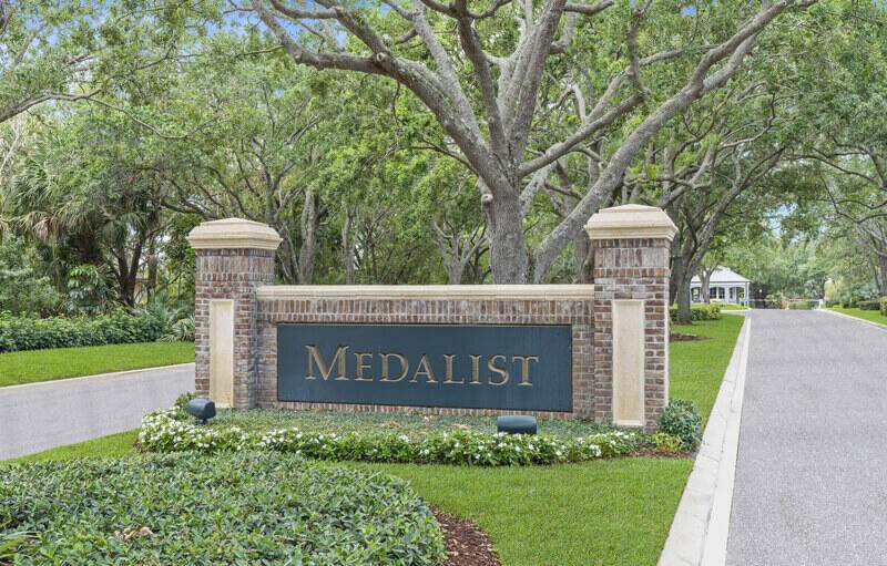 A beautiful vacant lot located on a cul de sac within the prestigious Medalist Village Golf Club in Hobe Sound.