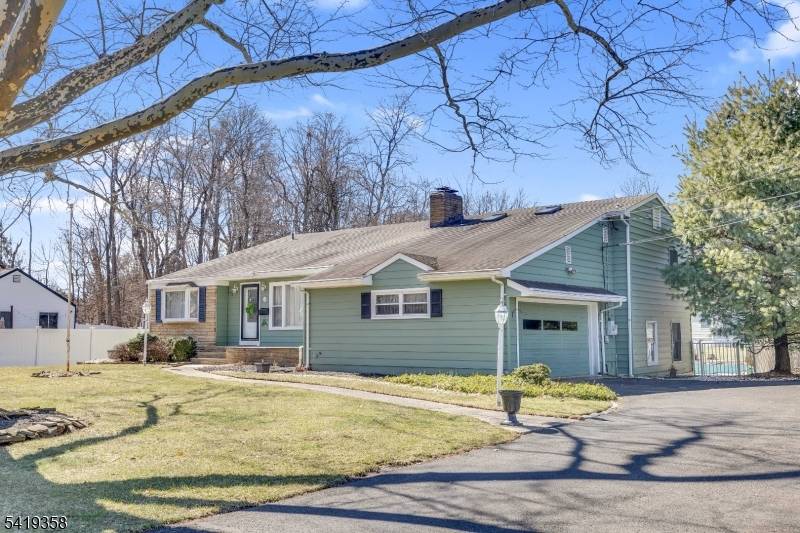 Discover this charming legal MOTHER DAUGHTER back to front split level home in the desirable Piedmont Section of Bound Brook.