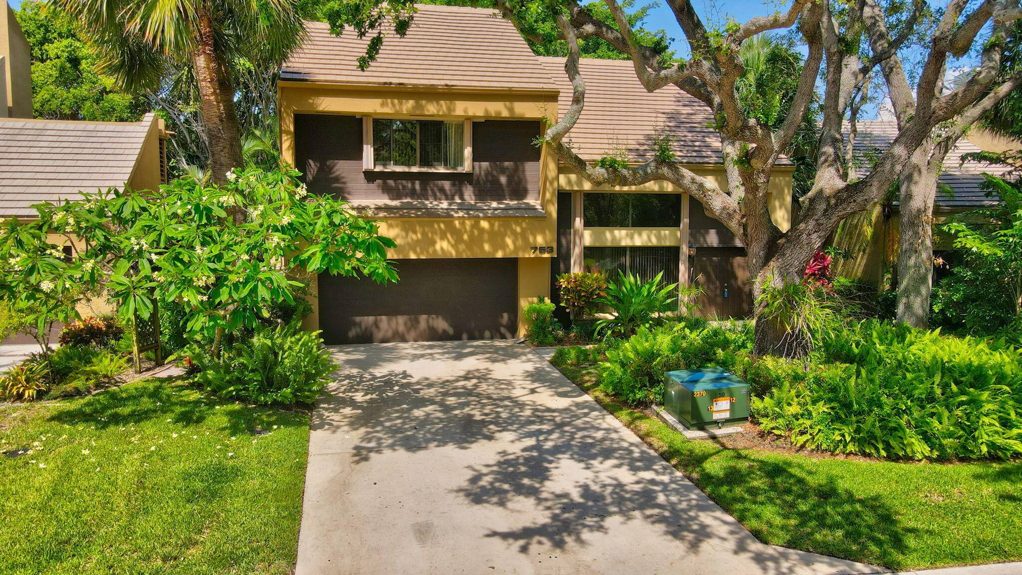 Free standing townhouse with no attached neighboring walls.