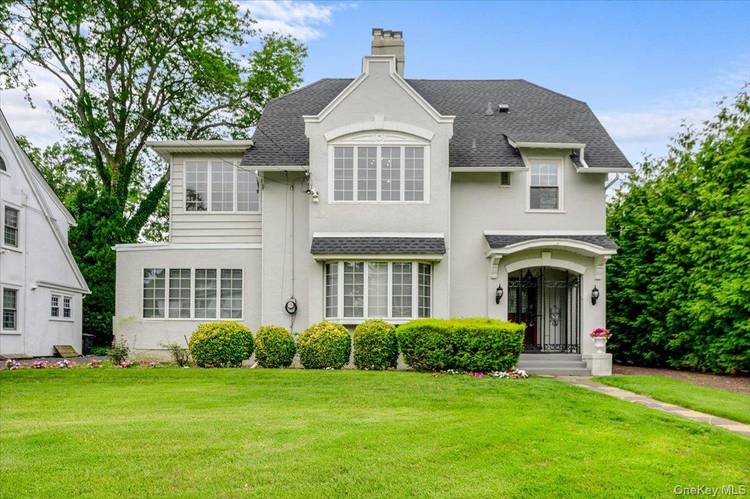 Rare Opportunity in the Heart of Woodmere s Prestigious Tree Streets !