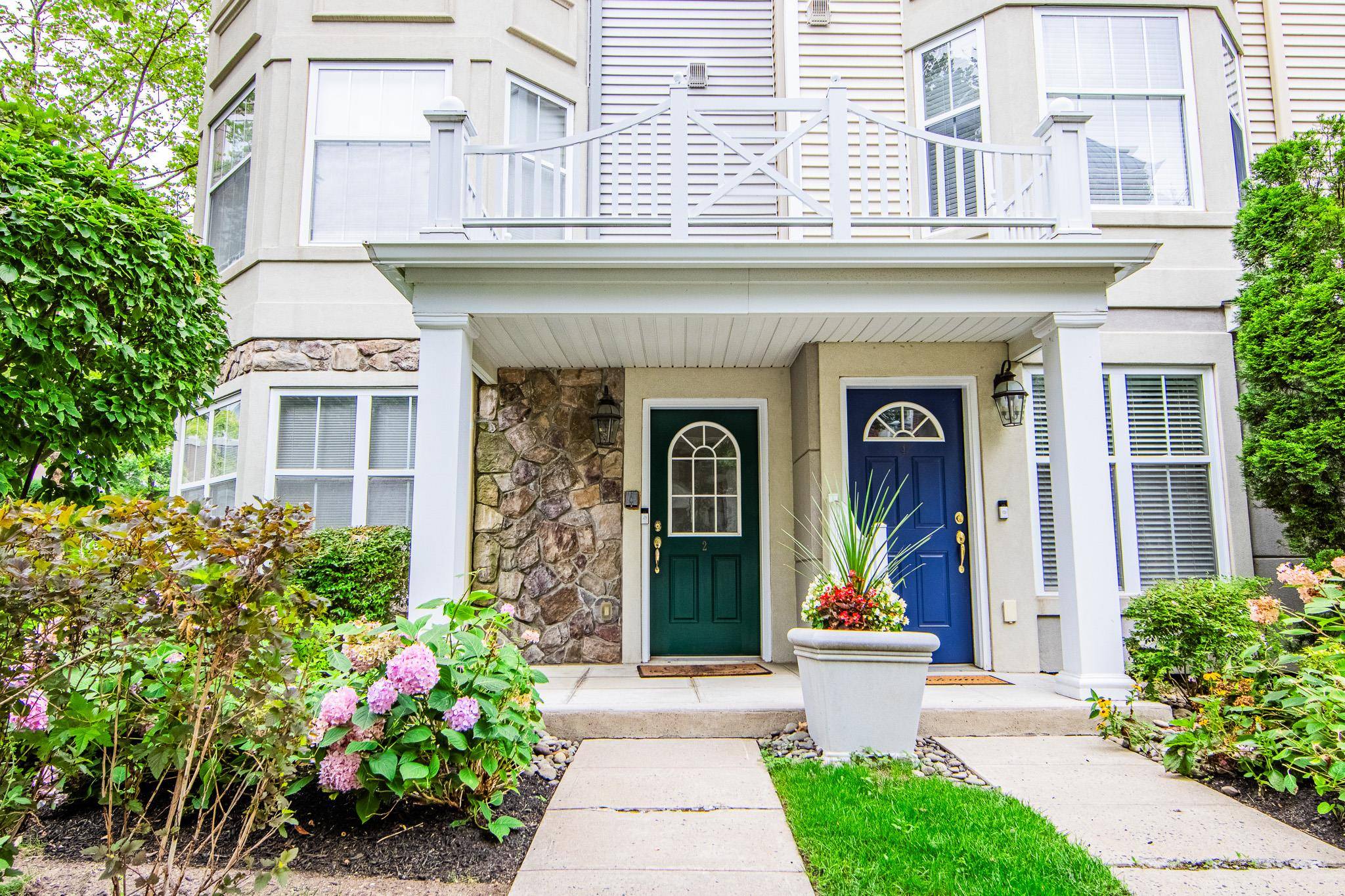 Discover this beautiful 4 level corner unit townhouse, The Byron Model, which is the only townhouse available in Harbors at Haverstraw with a double driveway and two car garage.
