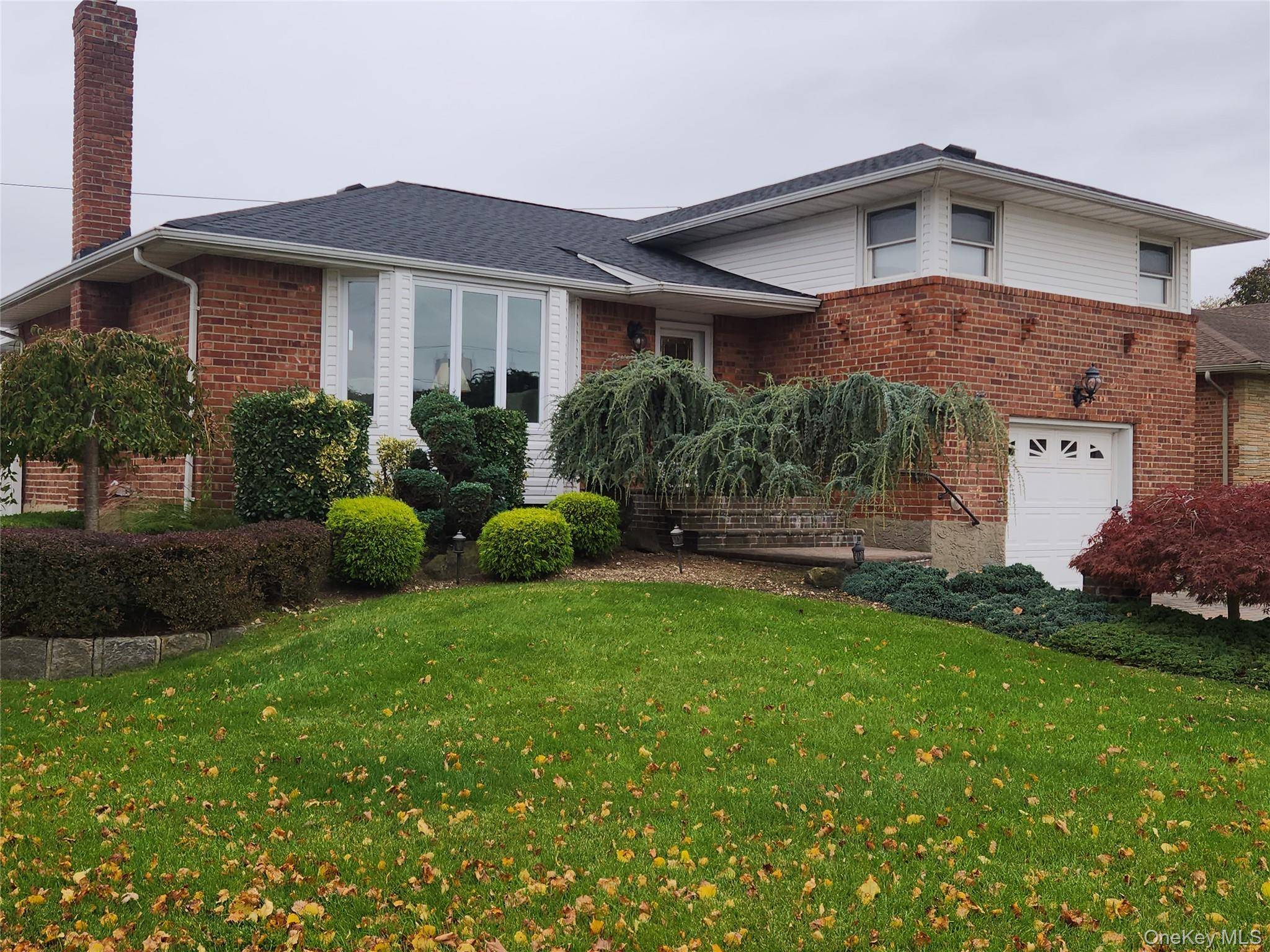 Welcome to this beautiful brick split level home, meticulously maintained and move in ready !