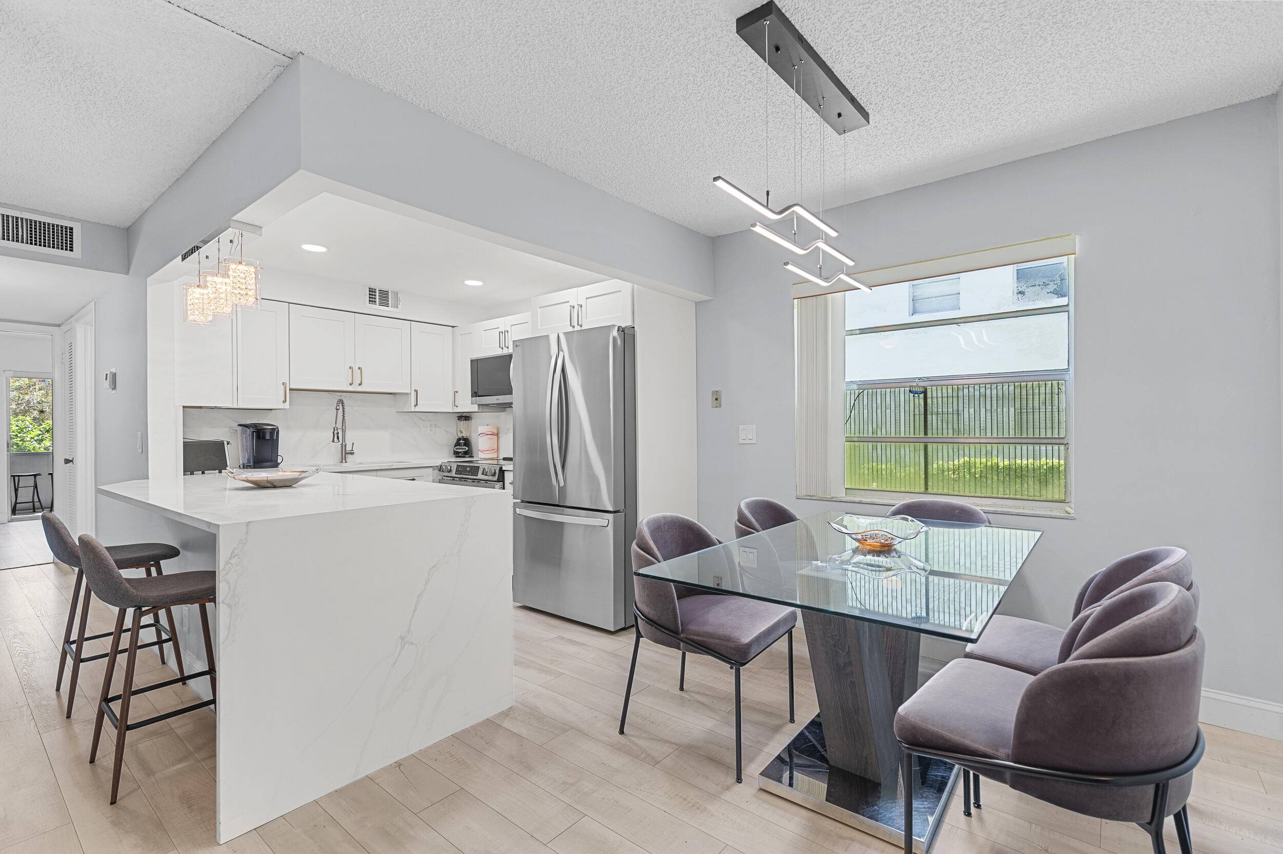 Sophisticated Corner Unit in Kings Point Fully Renovated Furnished !